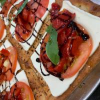 Crispino Square Pizza · Fresh mozzarella, tomato, basil, roasted peppers, balsamic glaze, on a garlic crust.