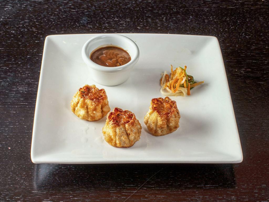 Shrimp Dumplings · Scallion, bamboo shoots, carrot & garlic.  Steamed or fried.