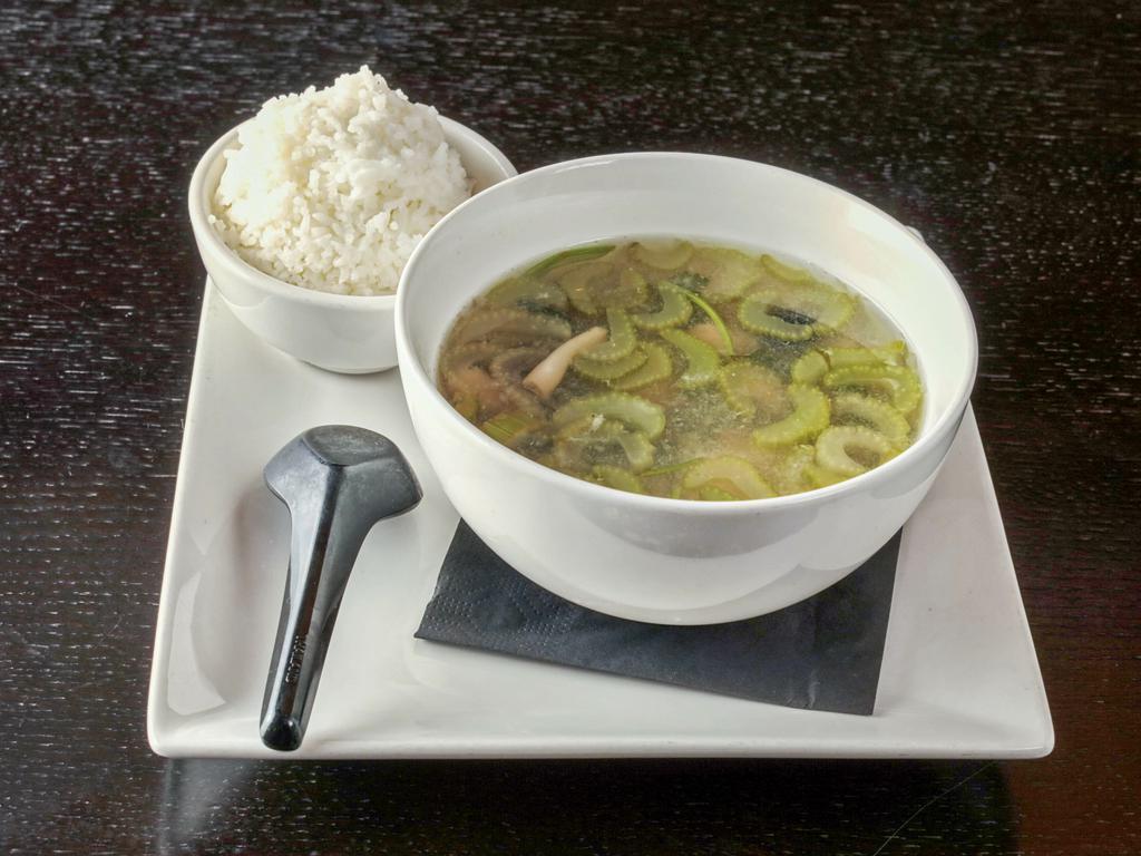 Tom Yum Soup · Chicken in mild lemongrass herb broth, with celery, mushroom and lime. 