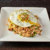 Malaysian Style Fried Rice · Sprout, pea, carrot, broccoli & onion topped with fried egg & crispy shallots. 