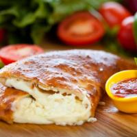 Cheese Calzone · mozzarella and ricotta cheese. Served with marinara Sauce.
