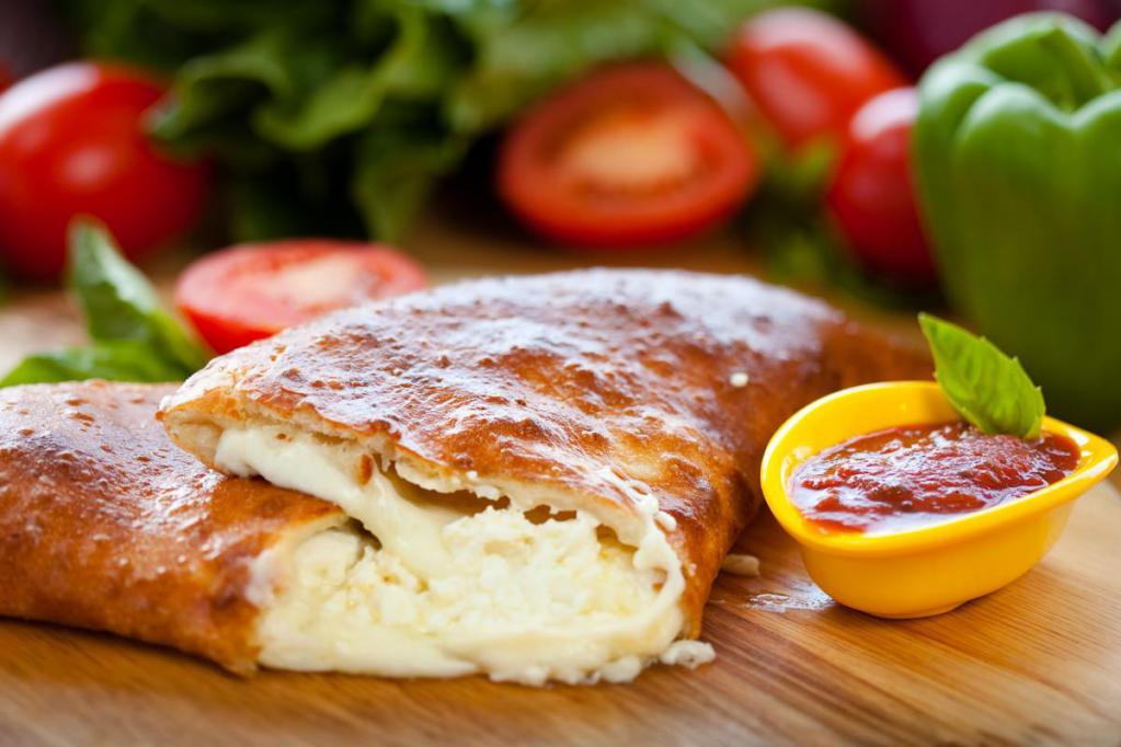Barbecue Chicken Calzone · Fried or grilled. Our calzones are made using mozzarella and cheddar cheese and come with 1 side of sauce.