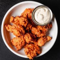15 Piece Buffalo Sauce Style Boneless Wings (gf) · Fried buttermilk all-natural boneless chicken wings tossed in buffalo sauce served with your...