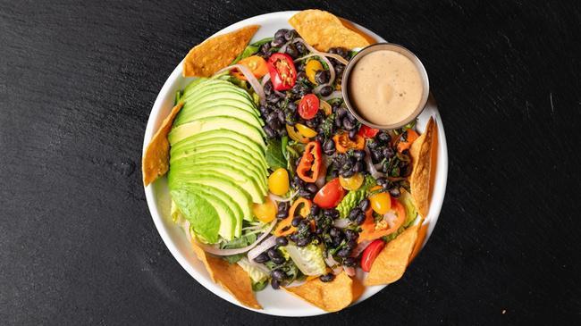 Entree Tex Mex (gf) · Organic baby greens, avocado, organic grape tomatoes, pickled red onions, marinated black beans, pickled jalapenos, tri-color tortilla chips, chipotle buttermilk ranch.