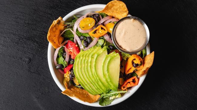 Side Tex Mex (gf) · Organic baby greens, avocado, organic grape tomatoes, pickled red onions, marinated black beans, pickled jalapenos, tri-color tortilla chips, chipotle buttermilk ranch.