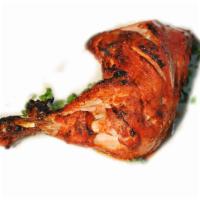 Chicken Tikka Leg · Chicken Leg seasoned with tandoori spices cooked over grill. Served with raita & chutney