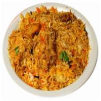 Chicken Biryani · Bone-in Chicken marinated and cooked in yogurt and in-house spices with basmati rice