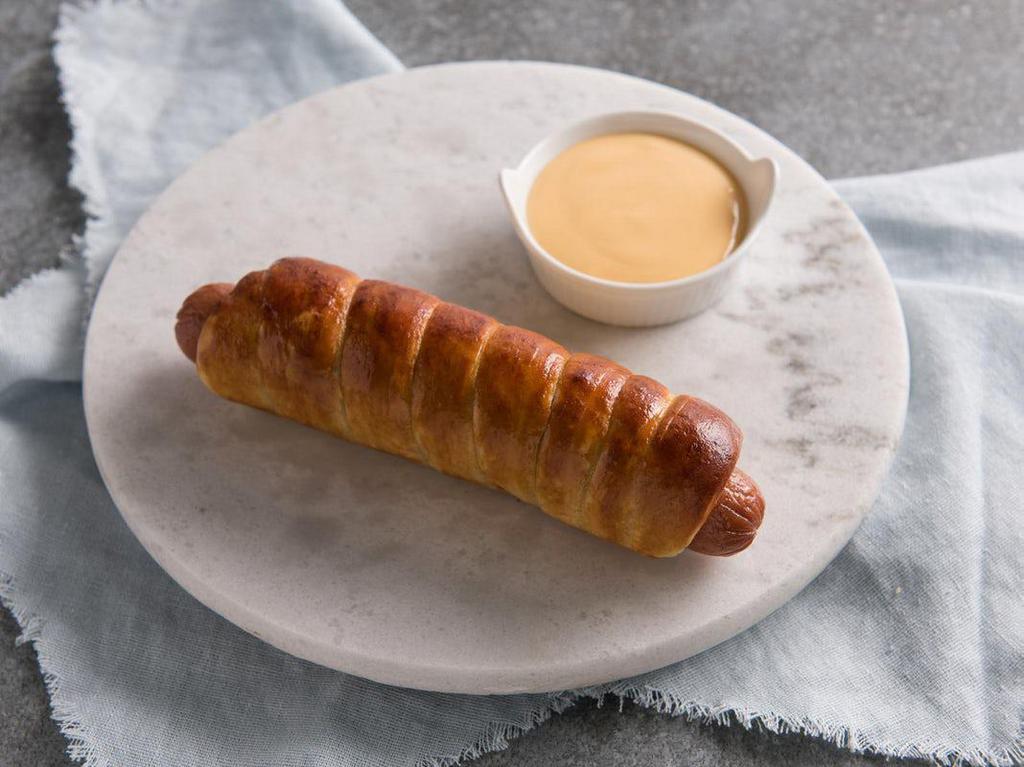 Original Pretzel Dog · Our famous pretzel dough wrapped around a Nathan’s Famous® hot dog is not your average snack. It’s a power-packing, spirit-raising reward.