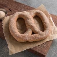 Cinnamon Sugar Pretzel · A pretzel hot from the oven, sprinkled with fresh cinnamon and sweet sugar.