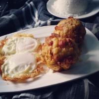 Bolon de Verde Desayunos · Con queso o chicharron y dos huevos. Fried green plantain dumplings with cheese or pork bell...