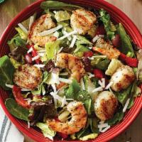 Johnny Rocco Seafood Salad · Wood-grilled shrimp and sea scallops served over romaine tossed with  roasted red peppers, k...