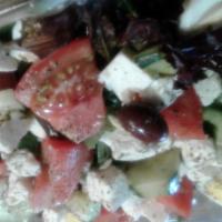 Greek Salad · Crispy iceberg and romaine with tomato, black olives, cucumber, green peppers, egg and onion...