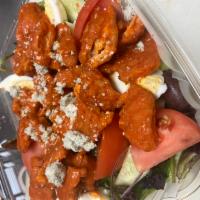 Buffalo Chicken Salad · Our house salad with spicy crispy or grilled chicken with bleu cheese crumble. Served with g...