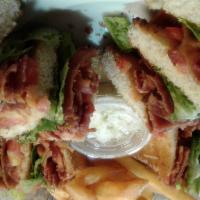 BLT · Served on white bread with french fries and coleslaw.