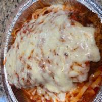 Chicken Parmesan · Served with linguini and marinara sauce with melted mozzarella cheese. Includes garlic bread.