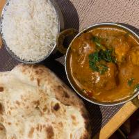 Chicken curry, Rice & Naan.  · Chicken curry comes with Rice and Naan
