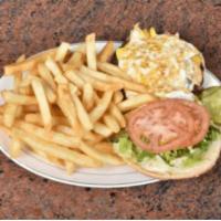 Super Texas Burger · 7oz Beef Burger with Fried Egg, Romaine Lettuce & Tomatoes.