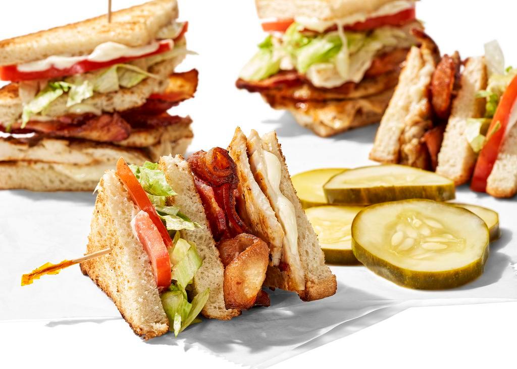 Grilled Chicken Club Sandwich · Bacon, grilled chicken, mayo, lettuce, tomato.