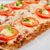 Margherita Pizza · (374 cal, 11 fat, 58 carbs, 15 protein) Low-fat mozzarella, tomatoes, roasted garlic, basil,...