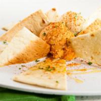 Hummus and Pita · (361 cal, 17 gm fat, 41 carbs, 11 gm protein) Artichoke & roasted red pepper hummus with lav...