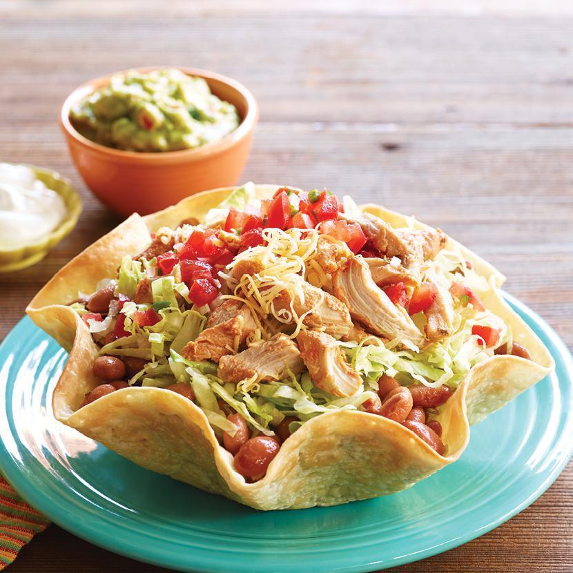 Baja Taco Salad Combo · Our taco salads are served in a freshly baked flour taco salad shell. Includes choice of meat, beans and toppings. Includes 21 oz. drink and your choice of side.
