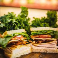 #5. Club Sandwich · Oven roasted turkey with lettuce, tomato, bacon & choice of cheese.

