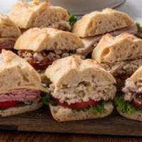 Sandwich and Soup Combo for 8 · Pick 8 of your choice, turkey royale, roasted turkey, tuna salad and ham and Swiss sandwiche...
