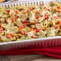 Family Chicken Pesto Pasta for 4 · Grilled chicken with penne pasta tossed in pesto sauce and diced tomatoes topped with Parmes...