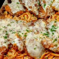 Parmesan Crusted Chicken Pasta for 8 · Crispy hand-breaded Parmesan chicken breast with melted mozzarella and marinara sauce over l...