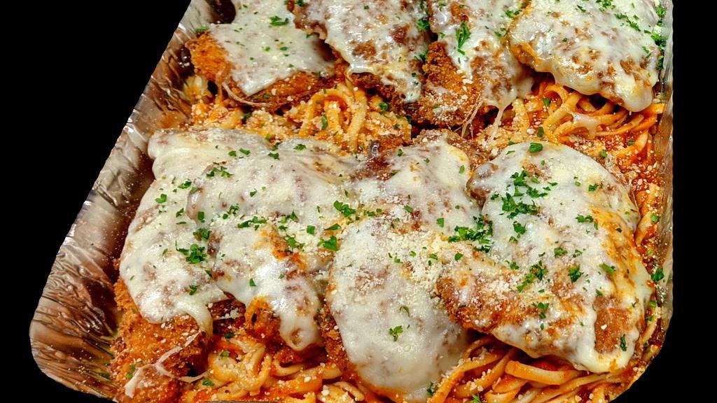 Parmesan Crusted Chicken Pasta for 4 · Crispy hand-breaded Parmesan chicken breast with melted mozzarella and marinara sauce over linguine. Served with freshly-baked French bread.