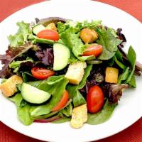 Side Garden Salad · Mixed greens, tomatoes, cucumbers, and croutons served with your dressing choice.