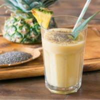 Pina Colada Smoothie · Pineapple, coconut, banana, raw agave, and organic coconut milk.