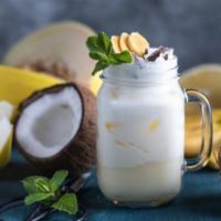 Lotta Pina Colada Smoothie · Pineapple, Caribbean coconut, vanilla yogurt, and soy milk.