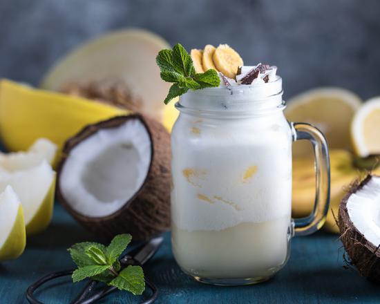 Lotta Pina Colada Smoothie · Pineapple, Caribbean coconut, vanilla yogurt, and soy milk.