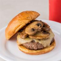 Mushroom Swiss Burger · 100% wagyu beef raised in texas. A 1/3 lb. beef patty with fresh mushrooms and melted Swiss ...