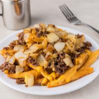 Phanatic Fries · Fries with cheese whiz, steak and onions.