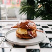 Carny Breakfast Sandwich · white cheddar scrambled eggs, bacon, chili flakes, toasted brioche 