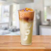 QQ Black Tea Latte · BACK: Black tea latte with our newest topping: QQ Balls! Chewy sweet potato & taro rounds wi...