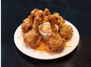 4. Lollipop Chicken · Pulled back chicken wings battered and fried to golden perfection