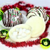 Hot Cocoa Bomb · Chocolate spheres filled with hot cocoa powder, marshmallows and assorted flavors. Place Hot...