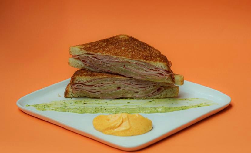 Bikini Sandwich · Honey ham, manchego cheese, traditional aioli  