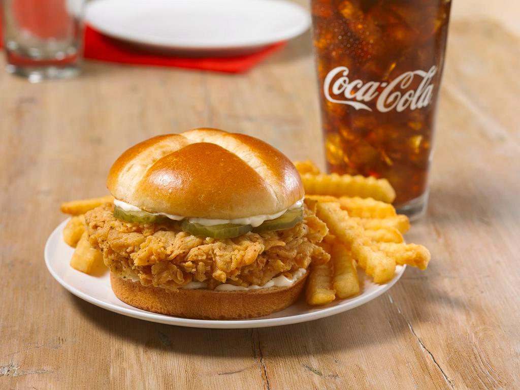 Chicken Sandwich Individual Combo · We crafted a sandwich using our legendary hand-battered chicken filet placed between a honey-butter brushed and toasted brioche bun. Enjoy this down home flavor with a regular side and large drink.