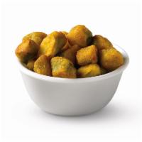 Fried Okra · Church's® fried okra is cut into delicious bite-sized bits, then fried to the perfect level ...