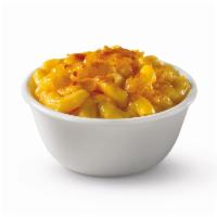 Baked Mac and Cheese · We take mac and cheese, sprinkle shredded cheddar cheese on top, then bake it to golden perf...