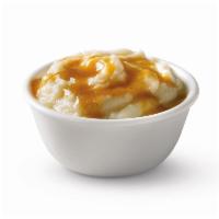 Mashed Potatoes · Before you even get to the potatoes, let's talk about silky, savory, rich gravy. OK, now tha...