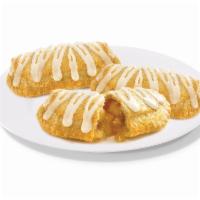 4 Apple Pies · Juicy apple slices sprinkled with cinnamon and wrapped in a flaky crust that will make your ...