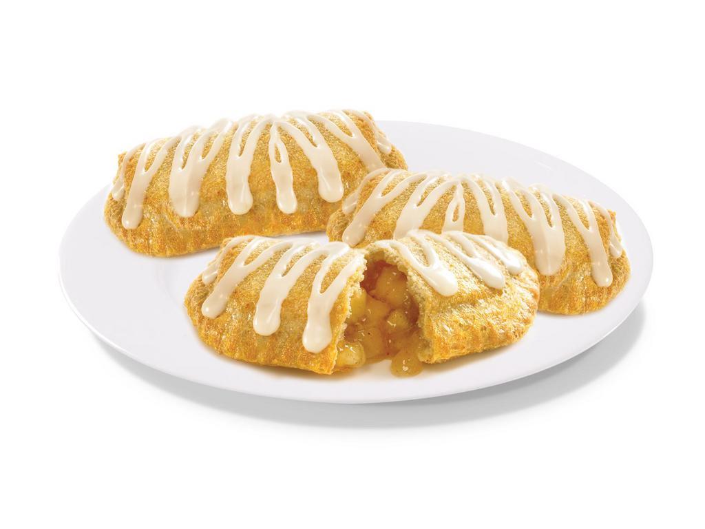 4 Apple Pies · Juicy apple slices sprinkled with cinnamon and wrapped in a flaky crust that will make your mouth water.