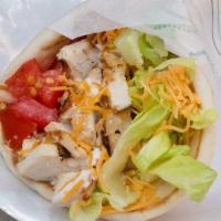 Greek Chicken Wrap · Grilled chicken breast, romaine lettuce, tomatoes and cucumber dressing.