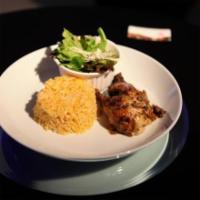 Jerk Chicken · Spicy roasted chicken served with rice and peas or pumpkin rice, sweet plantains, and garden...
