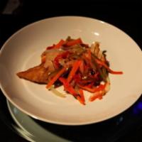 Escoveitch Fish · Fried snapper fillet, pickled vegetables, and fried dumplings.